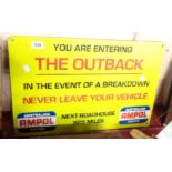 A modern reproduction painted cast iron Outback warning sign