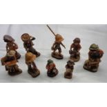 A collection of Anri (Italian) carved wood child and other figures - various designers and artists