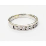 An import marked 375 white gold and diamond set half eternity ring by Canadian Ice, complete with