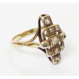 A marked 9ct. yellow metal Art Deco crossed panel ring, encrusted with old cut diamonds - wear