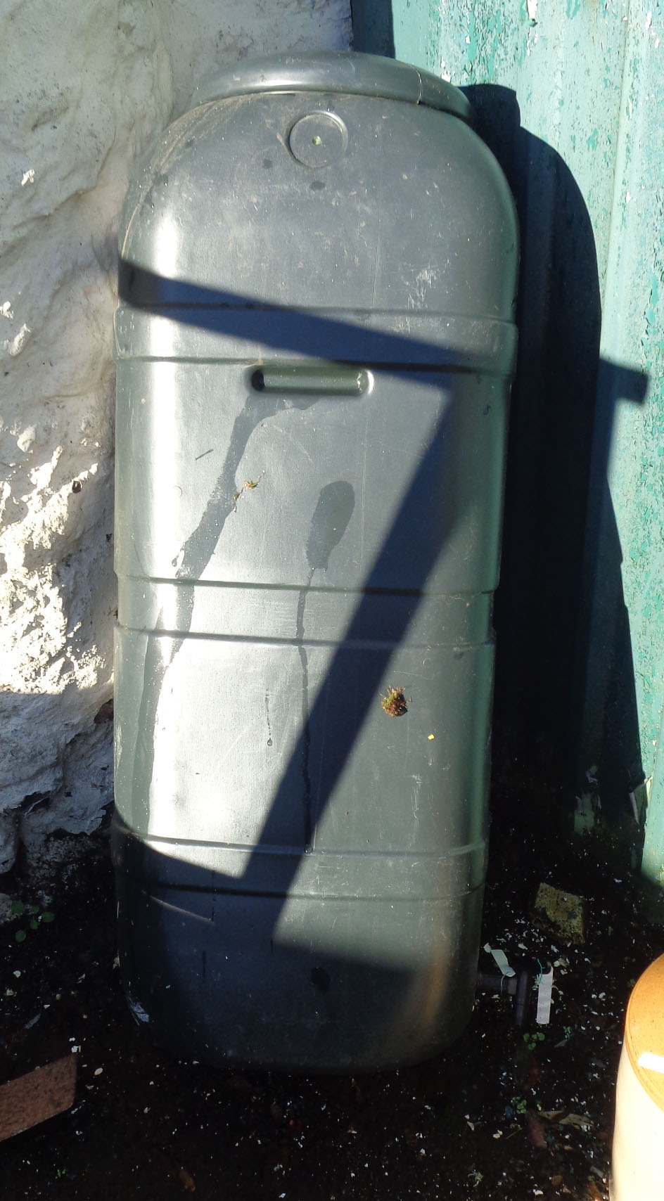 A plastic water tank with spigot