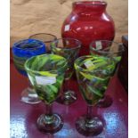 A set of four hand blown glasses and further art glass