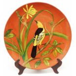 A late Victorian Minton painted and glazed terracotta plaque depicting a Golden Oriole bird