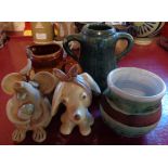A pottery vase and figures including SylvaC puppy and DT Sharp, Rye Pottery, etc.
