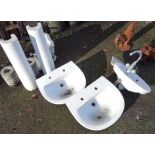 Four sinks including two pedestals and one vintage corner