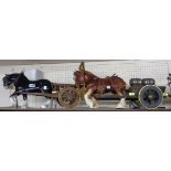 A large collection of ceramic heavy horses, four with carts
