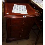 A 20" Frank Hudson reproduction mahogany bow front bedside chest of three long graduated drawers,