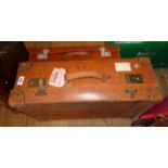 Two vintage leather suitcases