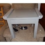 A 23 1/2" modern grey painted wood occasional table in the Chinese style, set on square legs