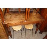 A 3' 9" old pine scrub-top kitchen table with drawer to one end, set on turned legs