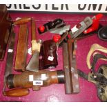 A collection of old tools including Este block plane, old woman's tooth plane, spoke shave, etc.