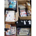 A large collection of posted envelopes and mid to late 20th Century postcards