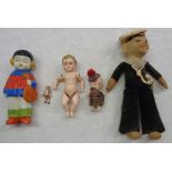 Five various dolls including a sailor, articulated doll, bisque, Japanese, etc.