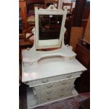 A 3' 6" French style dressing chest with bevelled oblong swing mirror and two trinket drawers over