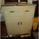 A 24" 1930`s "Ifco" painted wood bathroom cabinet with black glass top, long drawer and pair of