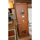 A vintage metal and bentwood bound travelling trunk with tray fitted interior and canvas weather