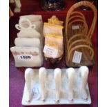 Four toast racks including Carlton Ware legs pattern