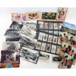 A collection of Gilbert & Sullivan cigarette cards and postcards