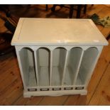 A 17 3/4" painted wood table-top file unit, set on front bracket feet