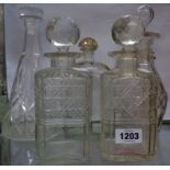 A pair of cut glass decanters, two others and a Jerez, liquor bottle