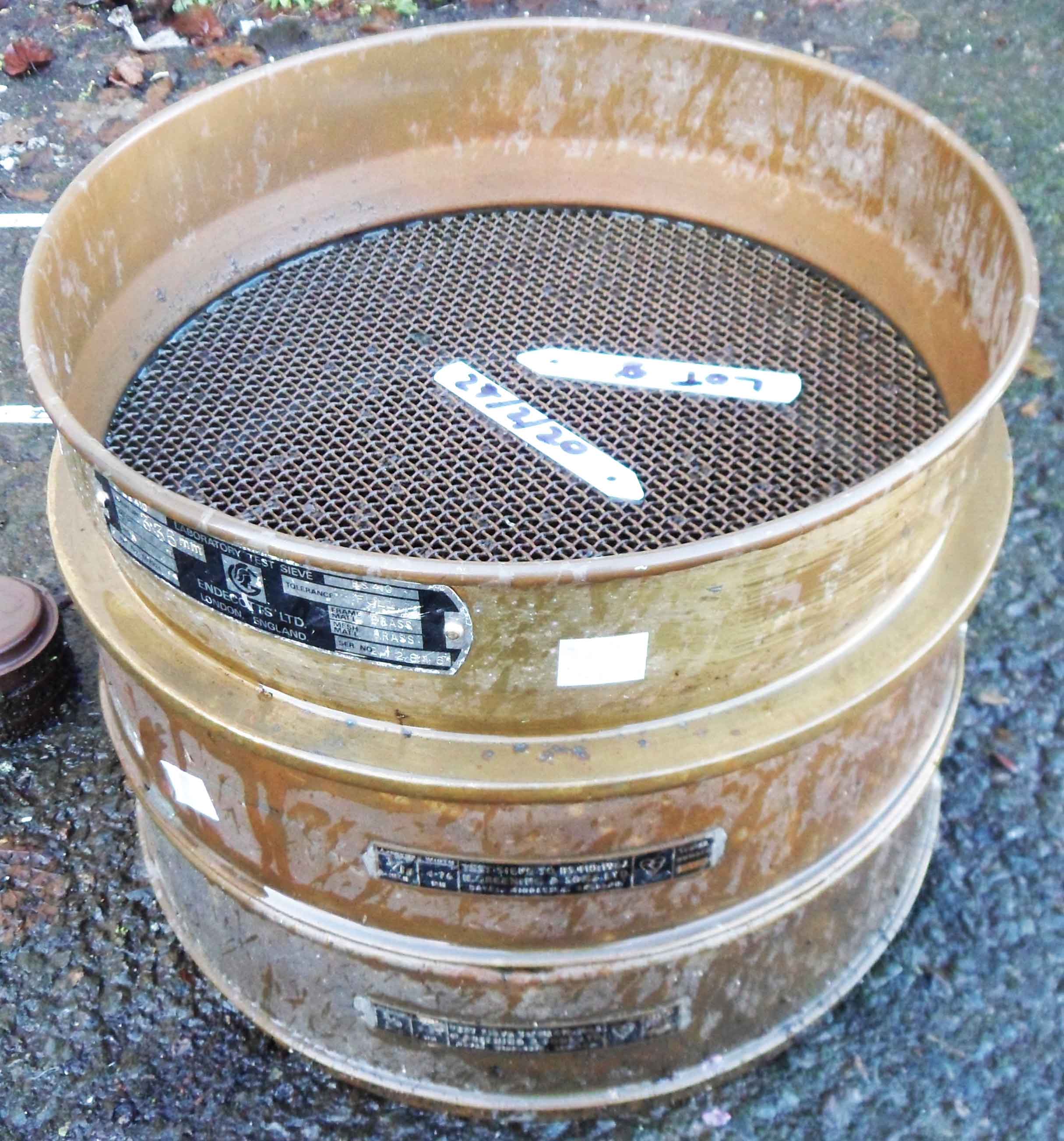 Three stacking brass laboratory sieves