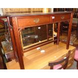 A 3' 6" reproduction mahogany, cross banded and strung Chippendale style hall table with two