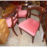 A set of six 19th Century mahogany framed dining chairs with wide curved top rails and overstuffed