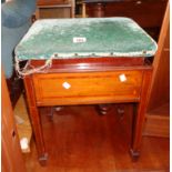 An Edwardian mahogany and strung piano stool with ratchet rise and fall action, set on square