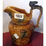 An Arthur Wood & Son treacle glaze jug with horse decoration