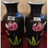 A pair of 1920`s black gourd vases with stencilled floral decoration