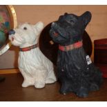 A pair of vintage composition advertising dog figures for Black & White Whisky