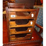 A 12 1/2" vintage stained wood table-top filing unit with four drawers