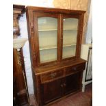 A 3' 11 1/2" Victorian stained pine two part dresser with glazed top section (cornice reduced)