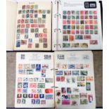 Three albums containing a collection of 20th Century hinge mounted world stamps