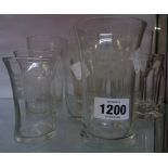 Eight assorted antique pub glasses including a set of three graduated glasses from the Palace