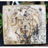 A modern cast concrete garden lion mask fountain head