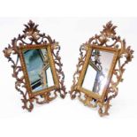 A pair of gilt brass framed easel mirrors