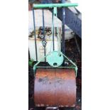 A vintage Ironcrete cast iron and concrete garden roller