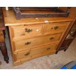 A 36" 20th Century pine chest of two short and two long graduated drawers, set on bracket feet -