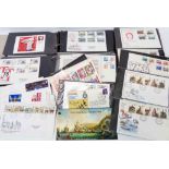 Two ring bound covers albums containing IOM FDC's - sold with other loose FDC's and some stamps