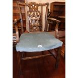 A Chippendale style mahogany framed ribbon back carver chair with studded blue velour upholstered