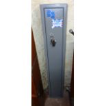 A Brattonsound grey painted metal three gun cabinet - with keys