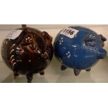 Two pottery piggy banks