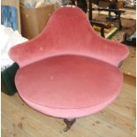 A 3' 3" Edwardian camel back boudoir corner chair upholstered on old rose velour, set turned and
