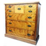 A 48 1/2" 19th Century satin birch chest with central deep drawer, four flanking short drawers and