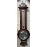 A 1930`s polished oak mounted wall barometer/thermometer - bearing presentation plaque