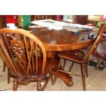 A 3' 10 3/4" diameter 19th Century mahogany breakfast table, set on faceted and tapered pillar