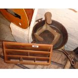 A carved wood letter rack, cast iron skillet and shoe last