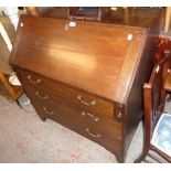 A 3' 1" 19th Century polished oak bureau with fitted interior and three long graduated drawers