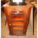 A 20" Victorian inlaid walnut music cabinet with named shelves enclosed by a glazed panel door,